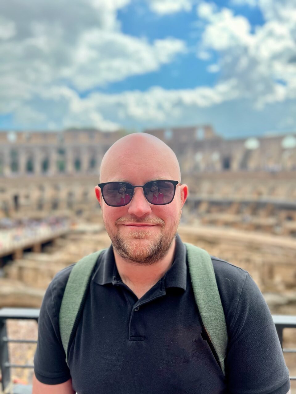 A photo of geoenvironmental consultant Rick Saville at the coliseum in Rome, Italy