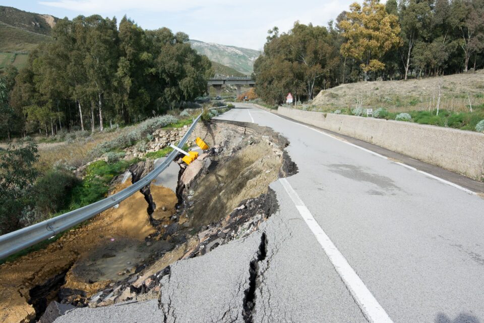 Geoscience and geotechnical process in West Yorkshire. An image showing a severe road collapse.