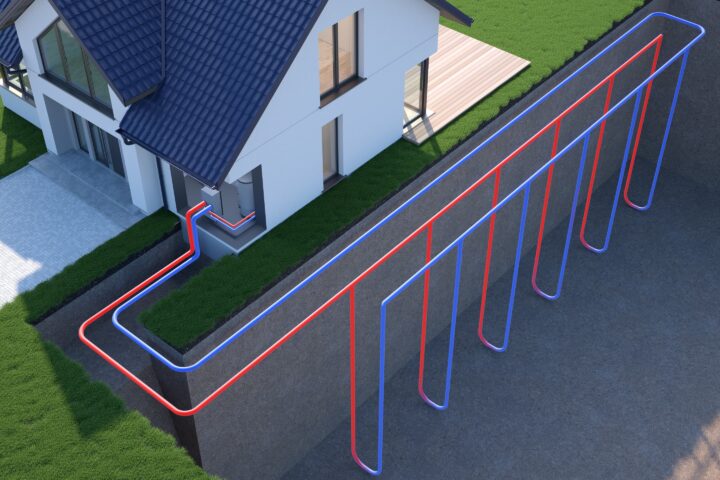 A ground source heating installation graphic, showing heating and cooling pipes underground