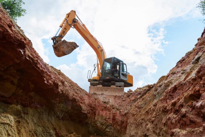 Phase 2 ground investigation in Yorkshire. An extractor is digging a hole.